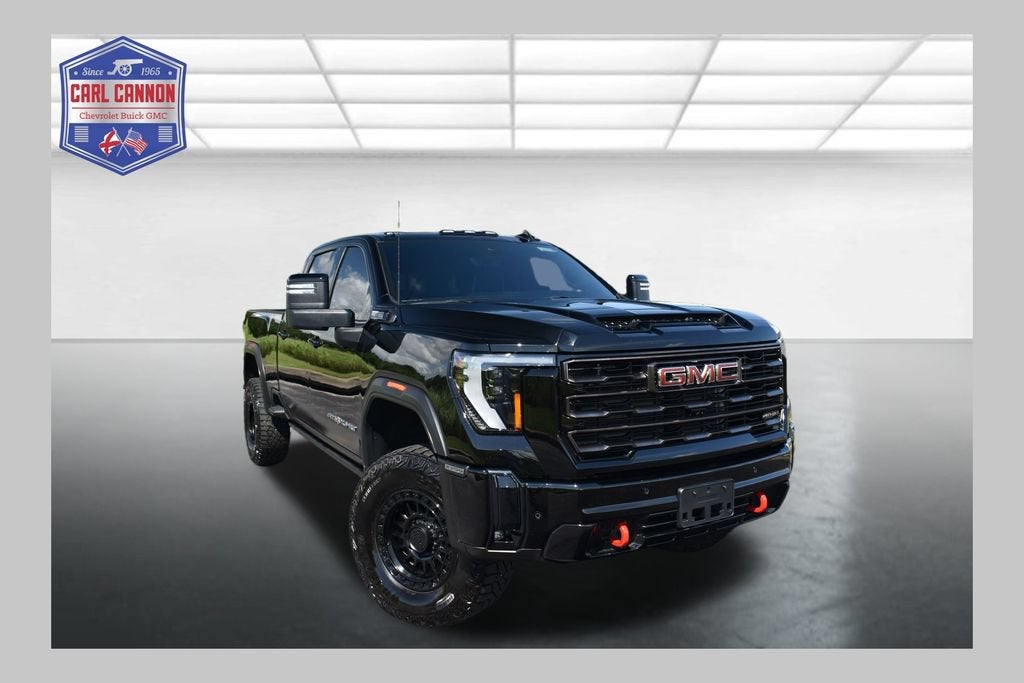 2025 GMC Sierra 2500 HD AT4X in Onyx Black — front three-quarter view