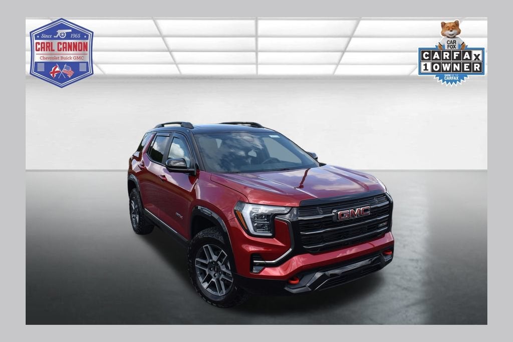 2026 GMC Terrain AT4 in Volcanic Red Tintcoat — front three-quarter view